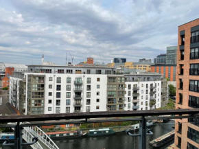 Glass penthouse with canal view